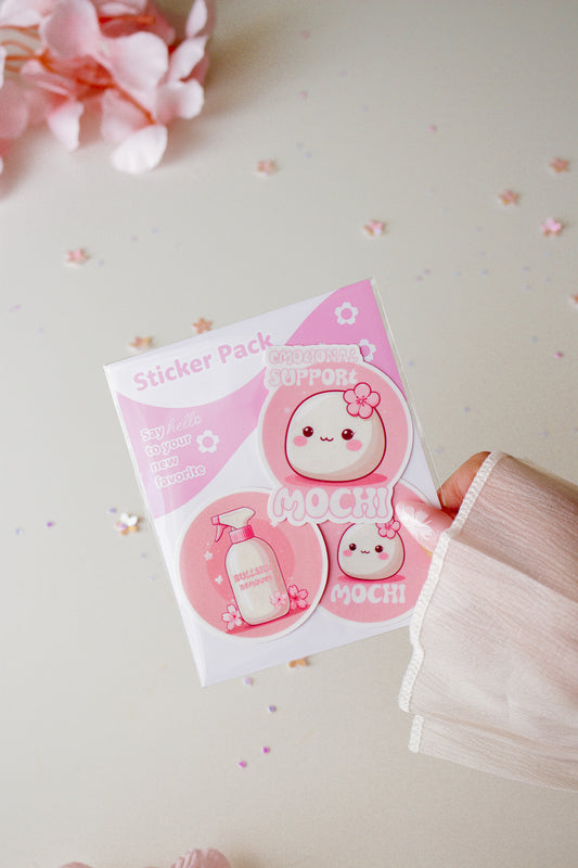 Mochi Sticker Pack in der Hand gehalten, kawaii Mochi Charaktere sichtbar
